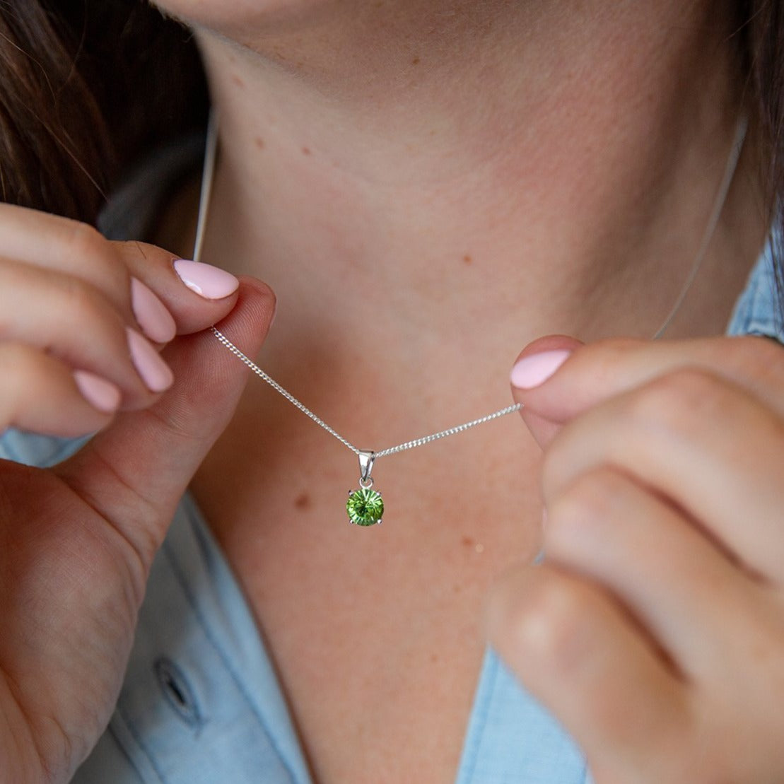 Gem Stone King Sterling Silver Peridot & Diamond Infinity Pendant Necklace - 0.92 Cttw, 18" Chain (Green Peridot, 6mm)