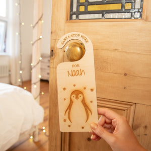 Santa Stop Here' Personalised Penguin Door Hanger